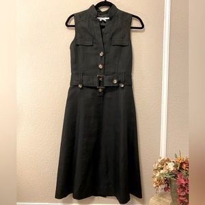 Black sleeveless dress with belt